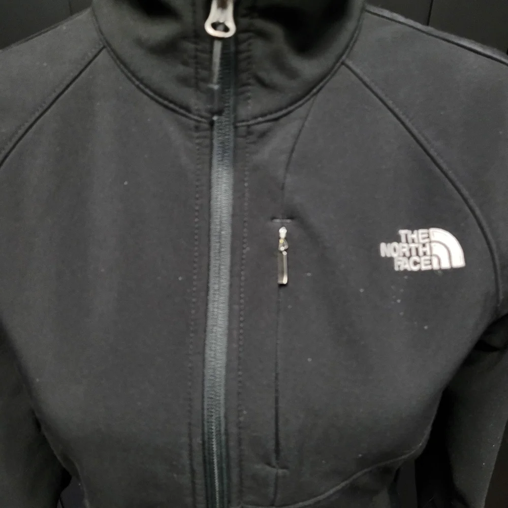 The North Face black zip up jacket